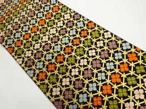 唐織亀甲に花菱模様織出し袋帯